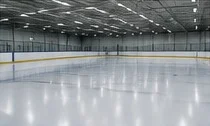 Indoor ice arena with a freshly maintained ice surface